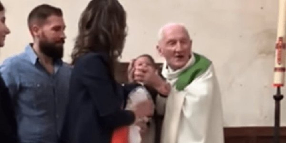French Priest Slaps Baby Baptism